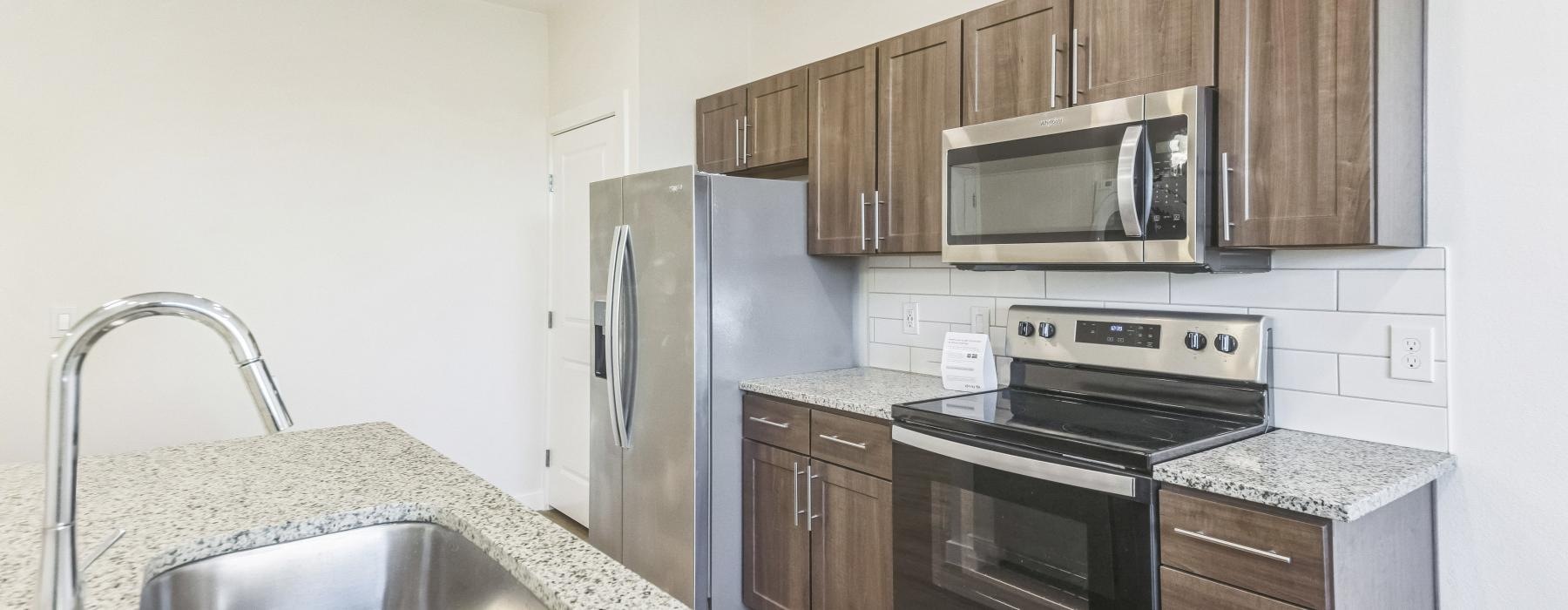 a kitchen with stainless steel appliances