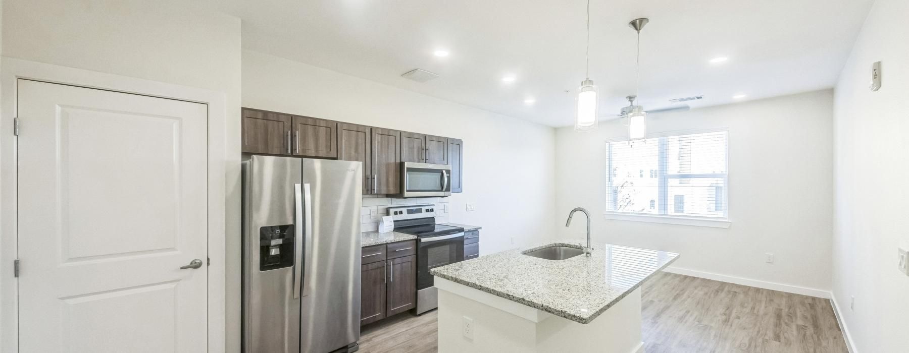 a kitchen with a large island