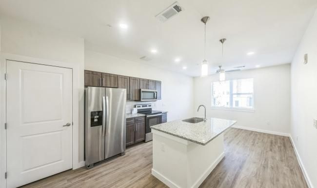 a kitchen with a large island