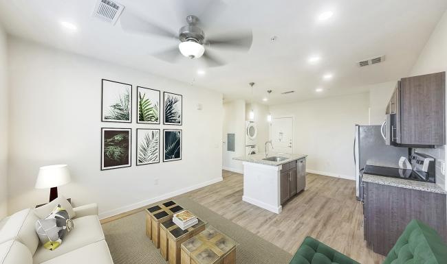 a living room with a couch and a table