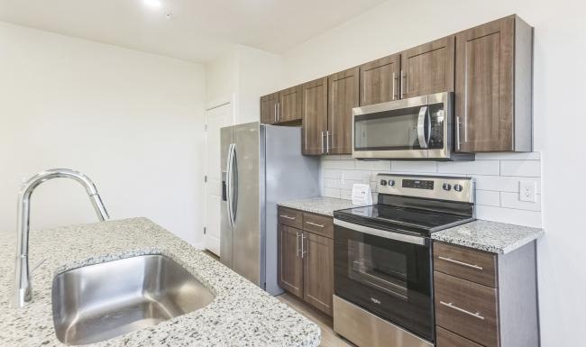 a kitchen with stainless steel appliances
