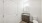 a bathroom with a toilet and sink