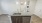 a kitchen with a sink and a washer